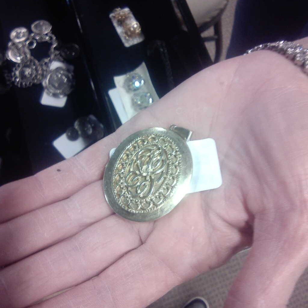 Gold Pendant with Intricate Design