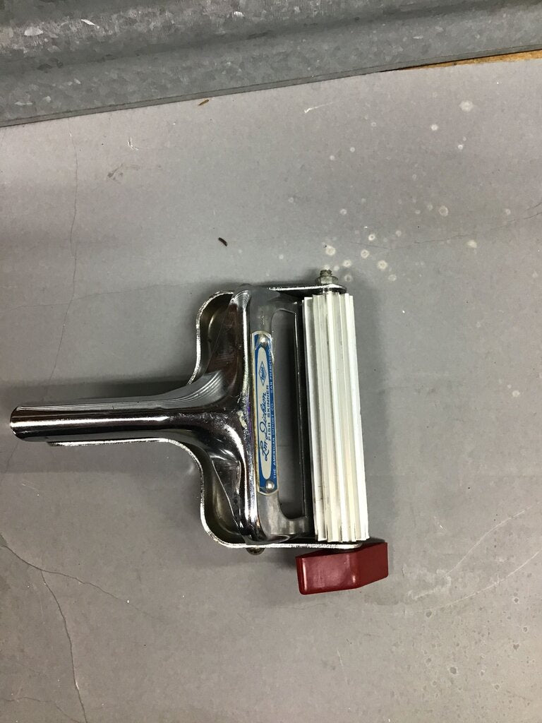 Vintage chrome plated fish skinner scaler