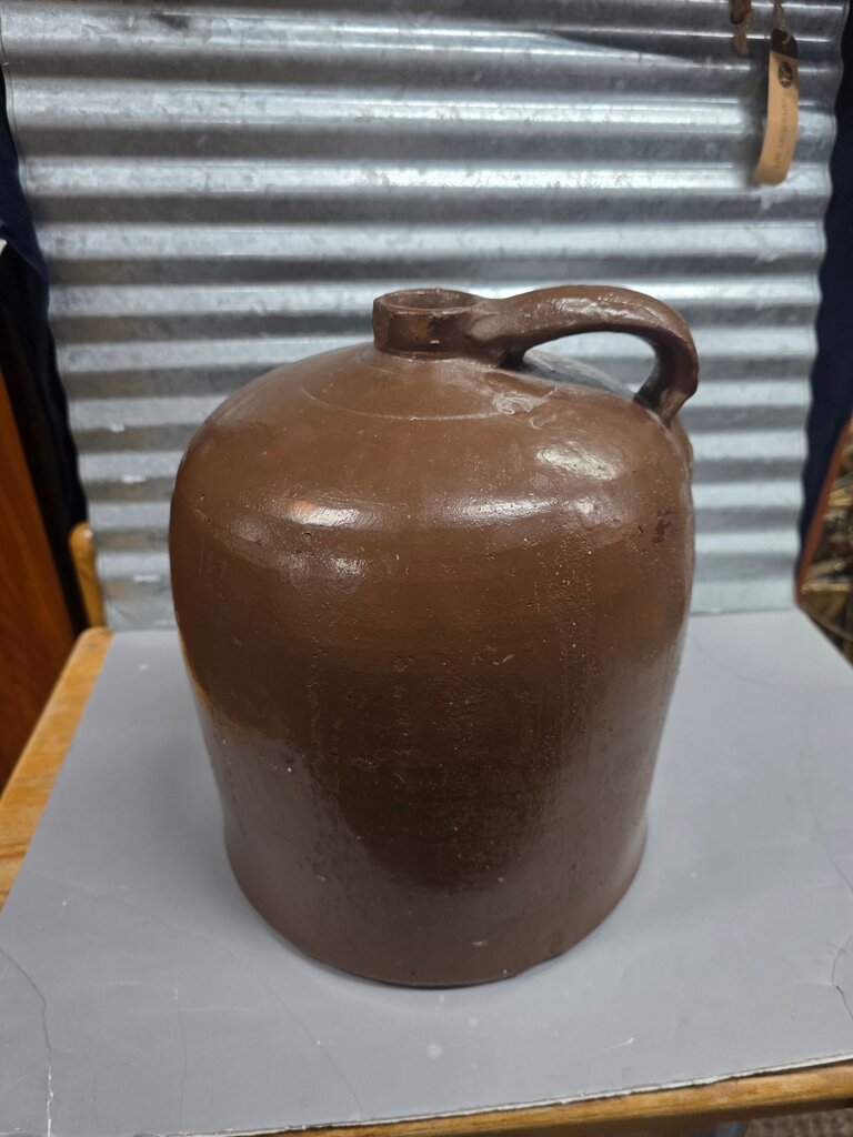 ANTIQUE STONEWARE LIQUOR JUG WITH LOOP HANDLE