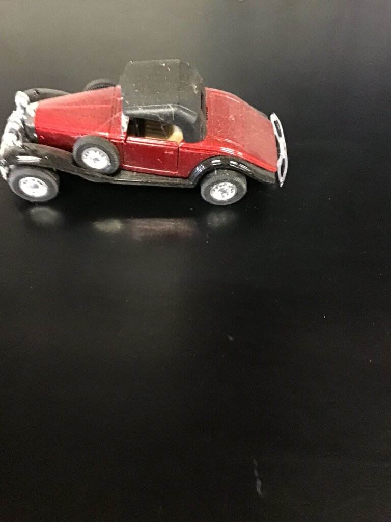 Vintage Red Diecast Car