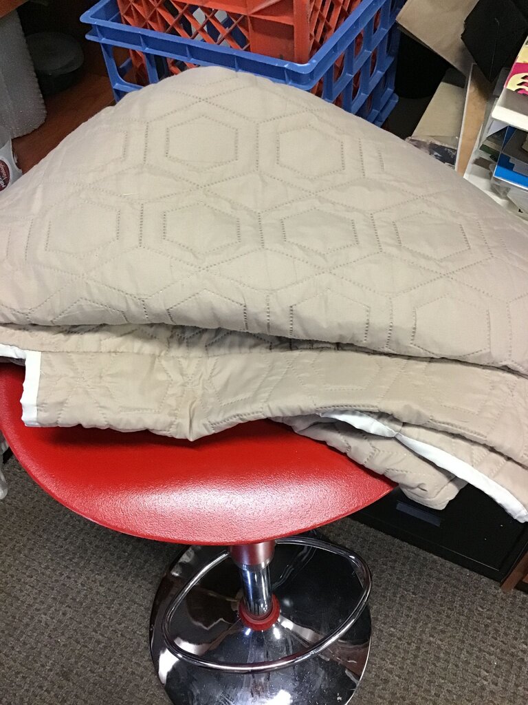 Beige Quilted couch cover