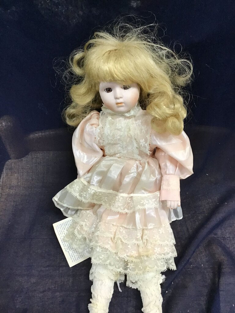 Vintage Porcelain Doll with Blonde Curly Hair