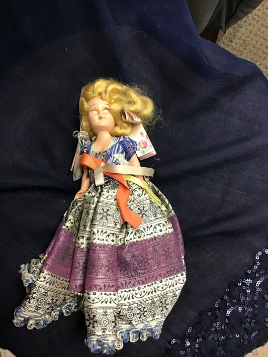 Vintage Doll with Colorful Dress