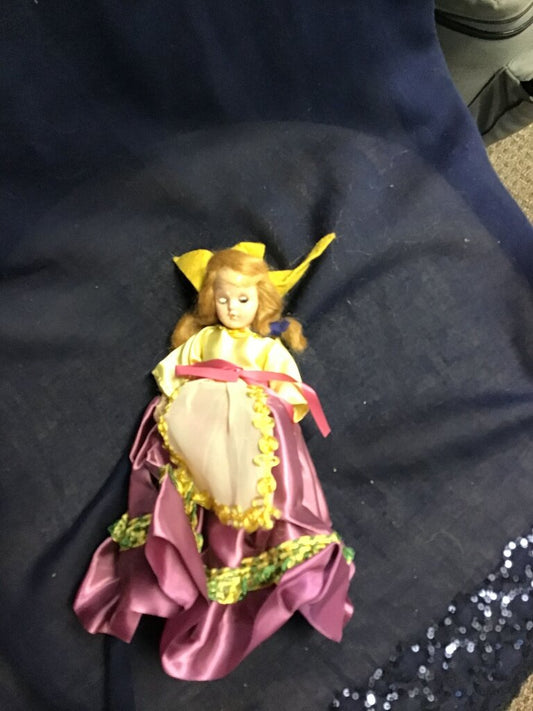 Vintage Doll with Yellow and Purple Dress