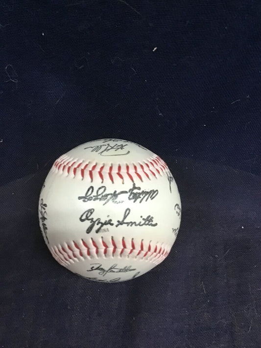 1980s Autographed Baseball by St Louis Cardinals featuring Ozzie Smith