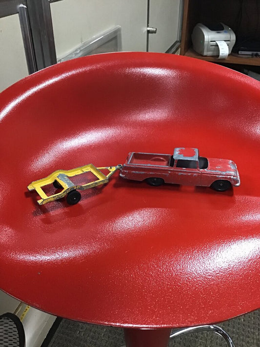 Vintage Red Toy Pickup Truck with Yellow Trailer
