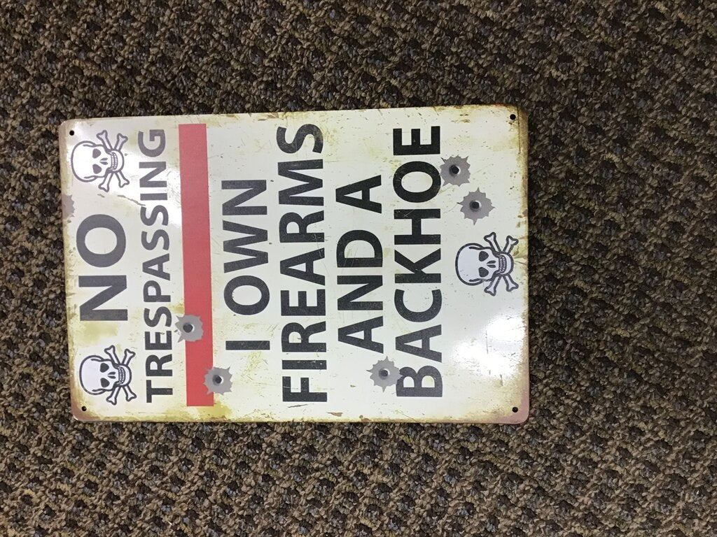 No Trespassing Sign - Firearms and Backhoe Warning